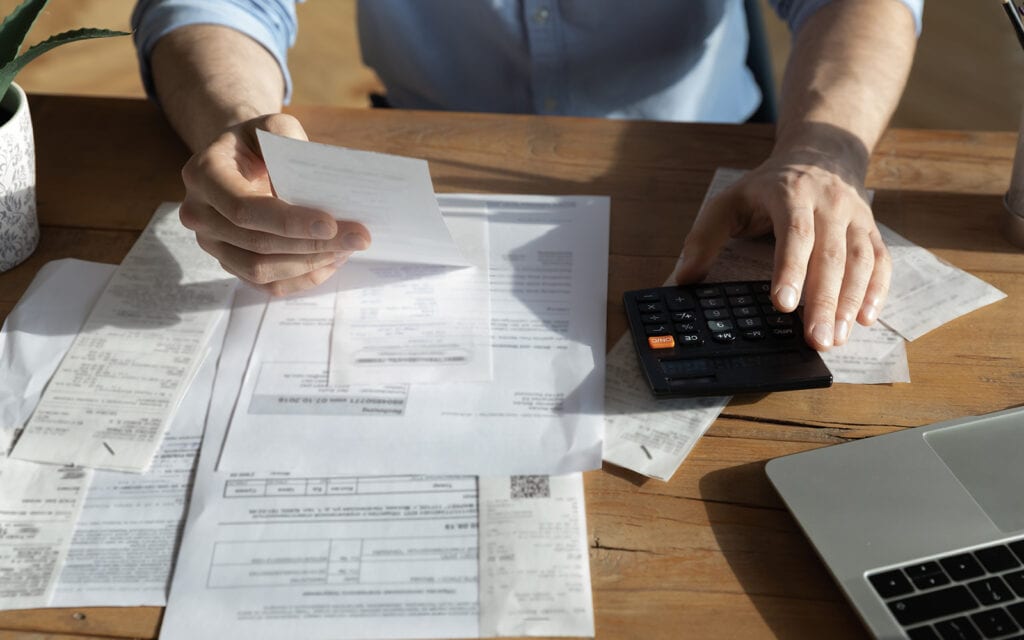 a man looking through his finances